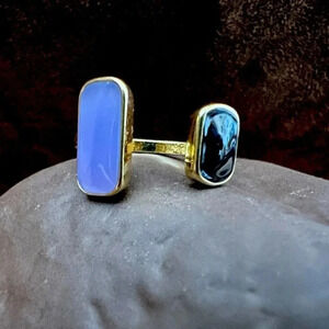 Ring- 2 faux rectangular stones, one lavender color and one smaller, black color